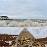 Buy canvas prints of Brighton west pier stormy sea by Julie Tattersfield