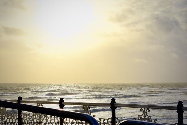 Brighton pier sun in Autumn Picture Board by Julie Tattersfield