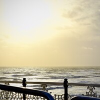 Buy canvas prints of Brighton pier sun in Autumn by Julie Tattersfield