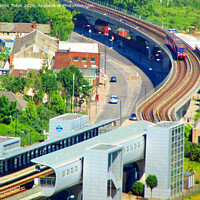 Buy canvas prints of Docklands Light Railway, London by Laurence Tobin