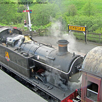 Buy canvas prints of Steam Train in Embsay station, North Yorkshire by Laurence Tobin