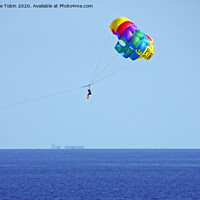 Buy canvas prints of Parasailing above the sea at Biarritz, France by Laurence Tobin