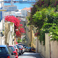 Buy canvas prints of Narrow Hill Streets of Gibraltar by Laurence Tobin