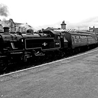 Buy canvas prints of Steam Locomotive in Keighley Station by Laurence Tobin