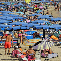 Buy canvas prints of Pleasure Beach Imagined.  Benidorm, Spain by Laurence Tobin