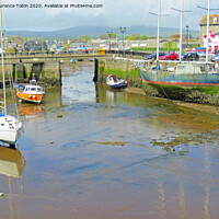 Buy canvas prints of Boats in Dry Dock, Isle of Man by Laurence Tobin