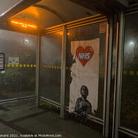 Buy canvas prints of NHS Thank you poster part torn in a bus stop, in the style of Banksy by Rhys Leonard