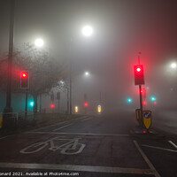 Buy canvas prints of Extremely foggy night time conditions at a junctio by Rhys Leonard