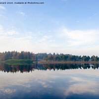 Buy canvas prints of Redmires reservoirs sheffield autumn tree reflections by Rhys Leonard