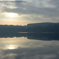 Buy canvas prints of Perfect symmetrical reflection of redmires reservoir by Rhys Leonard