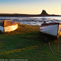Buy canvas prints of Golden Sunrise over Lindisfarne Castle by David Thomas