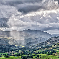 Buy canvas prints of Dramatic Storm Light Over Lake District by David Thomas