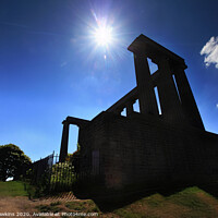 Buy canvas prints of Sunburst over Calton Hill National Monument by Philip Hawkins