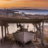 Buy canvas prints of Fishing boat on its jetty at sunset by Vicente Sargues