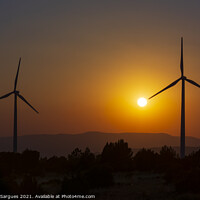 Buy canvas prints of Two windmills facing the sun at sunset by Vicente Sargues