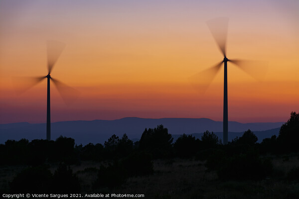 Two windmills in motion at sunset Picture Board by Vicente Sargues