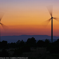 Buy canvas prints of Two windmills in motion at sunset by Vicente Sargues