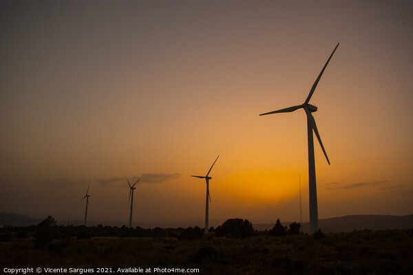 Windmills in a row at golden sunset light Picture Board by Vicente Sargues