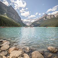 Buy canvas prints of Kayakers on Lake Louise by Pete Evans