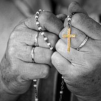 Buy canvas prints of Elderly lady s hands holding a rosary, black and w by Arpad Radoczy