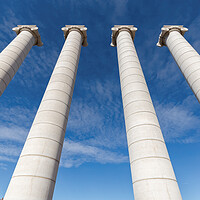 Buy canvas prints of Four massive columns, blue sky in Barcelona of Spain by Arpad Radoczy