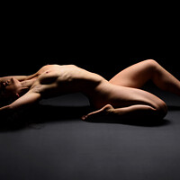 Buy canvas prints of nude young woman posing sexy by Alessandro Della Torre