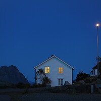 Buy canvas prints of A house that in the blue hours has a sign on the side of the street by Alessandro Della Torre
