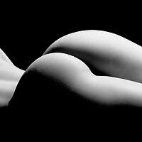 Buy canvas prints of ass of a woman naked and nude fine art photography bodyscape laying on black studio background by Alessandro Della Torre