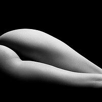 Buy canvas prints of ass of a woman naked in fine art photography bodyscape laying on black studio background by Alessandro Della Torre