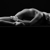 Buy canvas prints of Nude woman fine art naked lying sleeping on black by Alessandro Della Torre