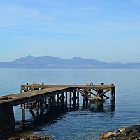 Buy canvas prints of Portencross jetty and Isle of Arran by Allan Durward Photography