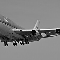 Buy canvas prints of KLM Boeing 747  landing over Maho beach (b/w) by Allan Durward Photography