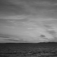 Buy canvas prints of Isle of Arran silhouetted at dusk (b&w) by Allan Durward Photography