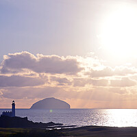 Buy canvas prints of Turnberry lighthouse and Ailsa Craig as sun sets by Allan Durward Photography