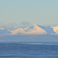 Buy canvas prints of Isle of Arran and its snow topped mountains  by Allan Durward Photography