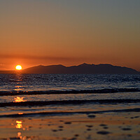 Buy canvas prints of Sunset behind silhouetted Isle of Arran by Allan Durward Photography