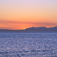 Buy canvas prints of Isle of Arran  silhouetted at sunset by Allan Durward Photography