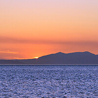 Buy canvas prints of Majestic Isle of Arran silhouetted at sunset by Allan Durward Photography