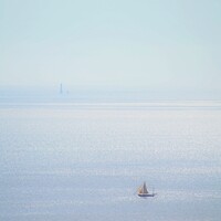 Buy canvas prints of Boat & Lighthouse. by Neil Mottershead