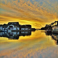Buy canvas prints of Sunrise Reflections In Looe. by Neil Mottershead