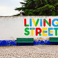 Buy canvas prints of Vibrant Graffiti in Obidos by Jesus Martínez