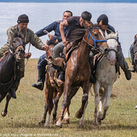 Buy canvas prints of Closeup shot of men riding horses in a field, Son Kul, Kyrgyzsta by Frank Bach