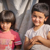 Buy canvas prints of Closeup shot of two smiling girls in Kyrgyzstan by Frank Bach