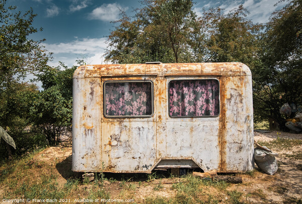 A closeup shot of a rusty wagon as a shelter Picture Board by Frank Bach