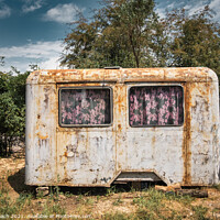 Buy canvas prints of A closeup shot of a rusty wagon as a shelter by Frank Bach