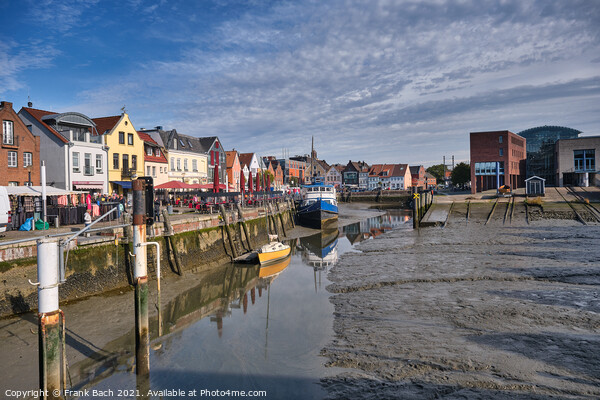 Husum harbor at ebb tide in the marshes, Germany Picture Board by Frank Bach