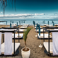 Buy canvas prints of Sunbeds on the beach in Playa Los Americas on Tenerife, Spain by Frank Bach
