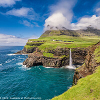 Buy canvas prints of Gasadalur with Mulafossur waterfall on Vagar, Faroe Islands by Frank Bach