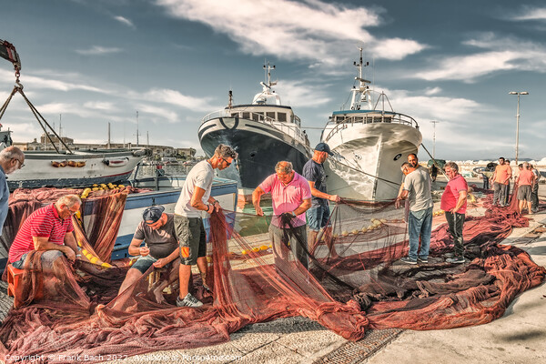 Local fishermen mending their nets in Trapani harbor on Sicily Picture Board by Frank Bach