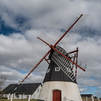 Buy canvas prints of Wind Mill on the wadden sea island Mandoe, Esbjerg Denmark by Frank Bach